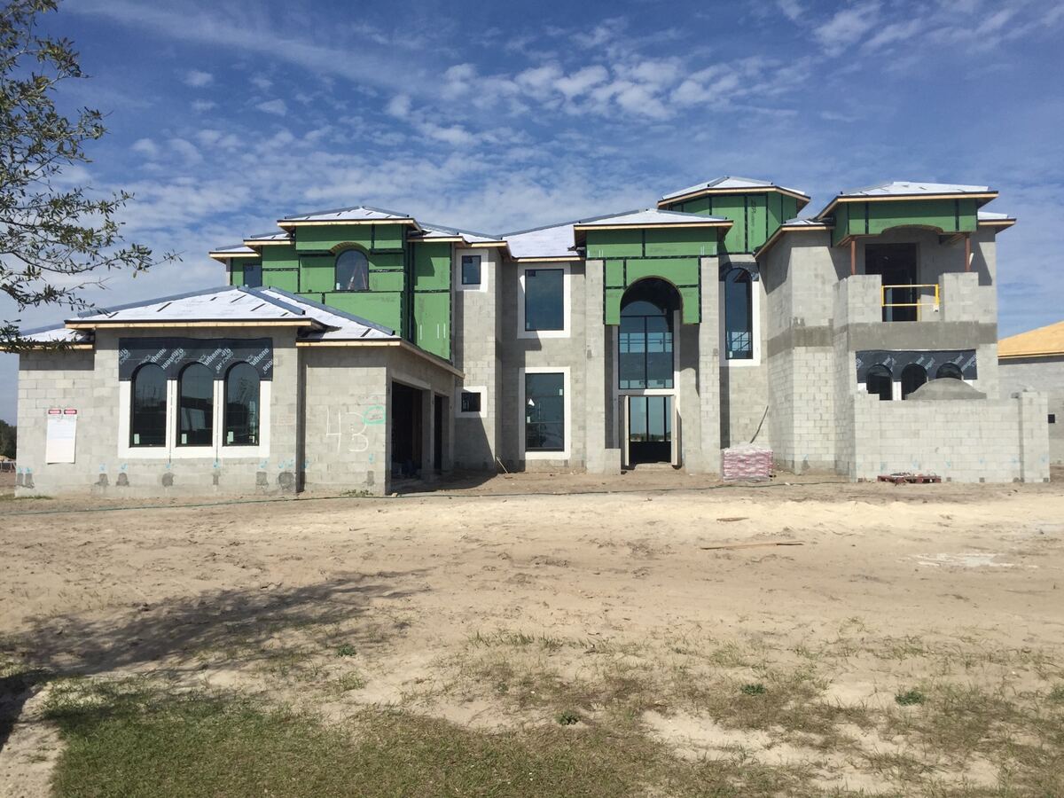 Large custom home with ZIP System wall sheathing during construction